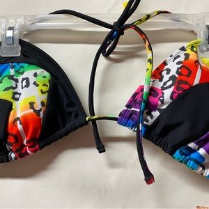 OP bright multicolored swim top, bikini top with straps. New with tags.